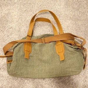 Green canvas weekender bag